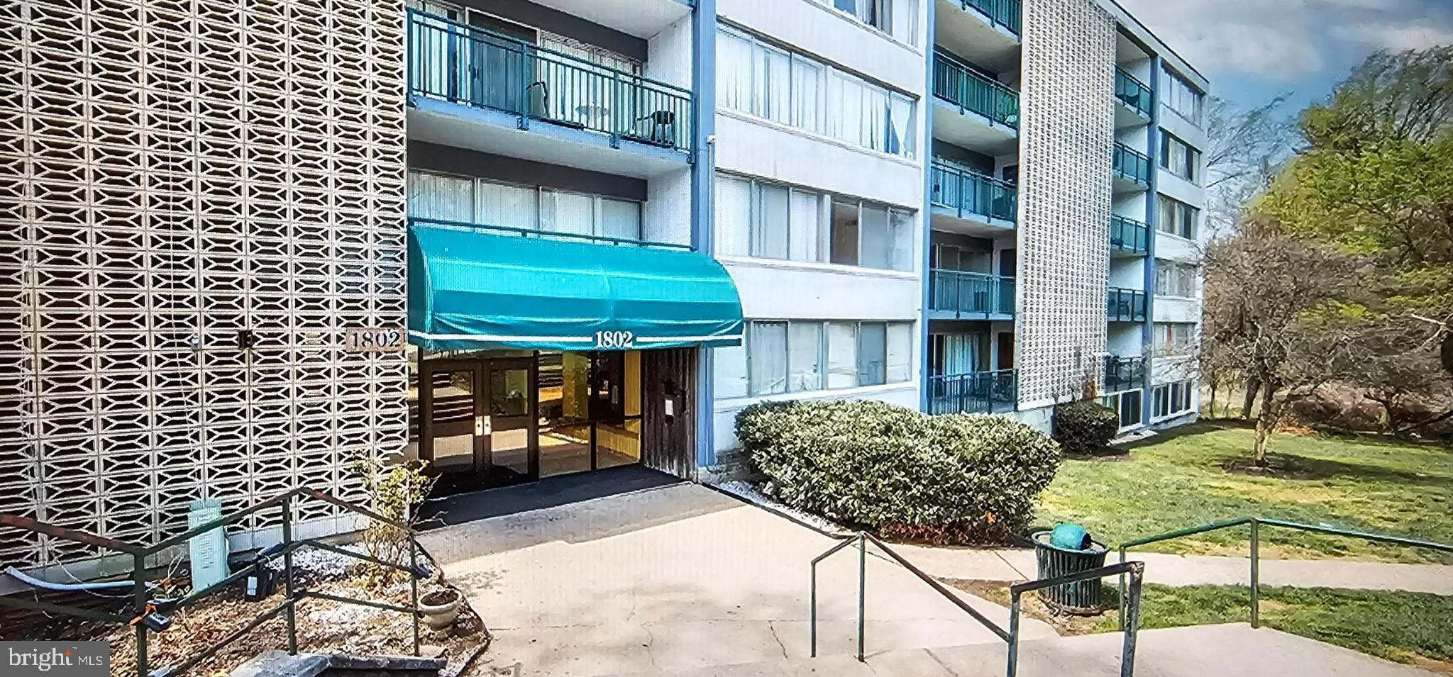 1802 Metzerott Road, Unit 503 Silver Spring, MD 20903 - Photo 11 of 11 a view of a brick building with many windows