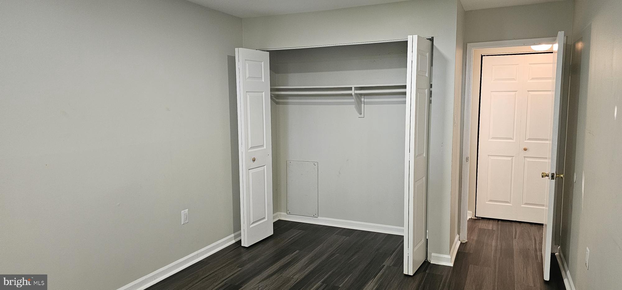 1802 Metzerott Road, Unit 503 Silver Spring, MD 20903 - Photo 2 of 11 a view of an empty room with wooden floor