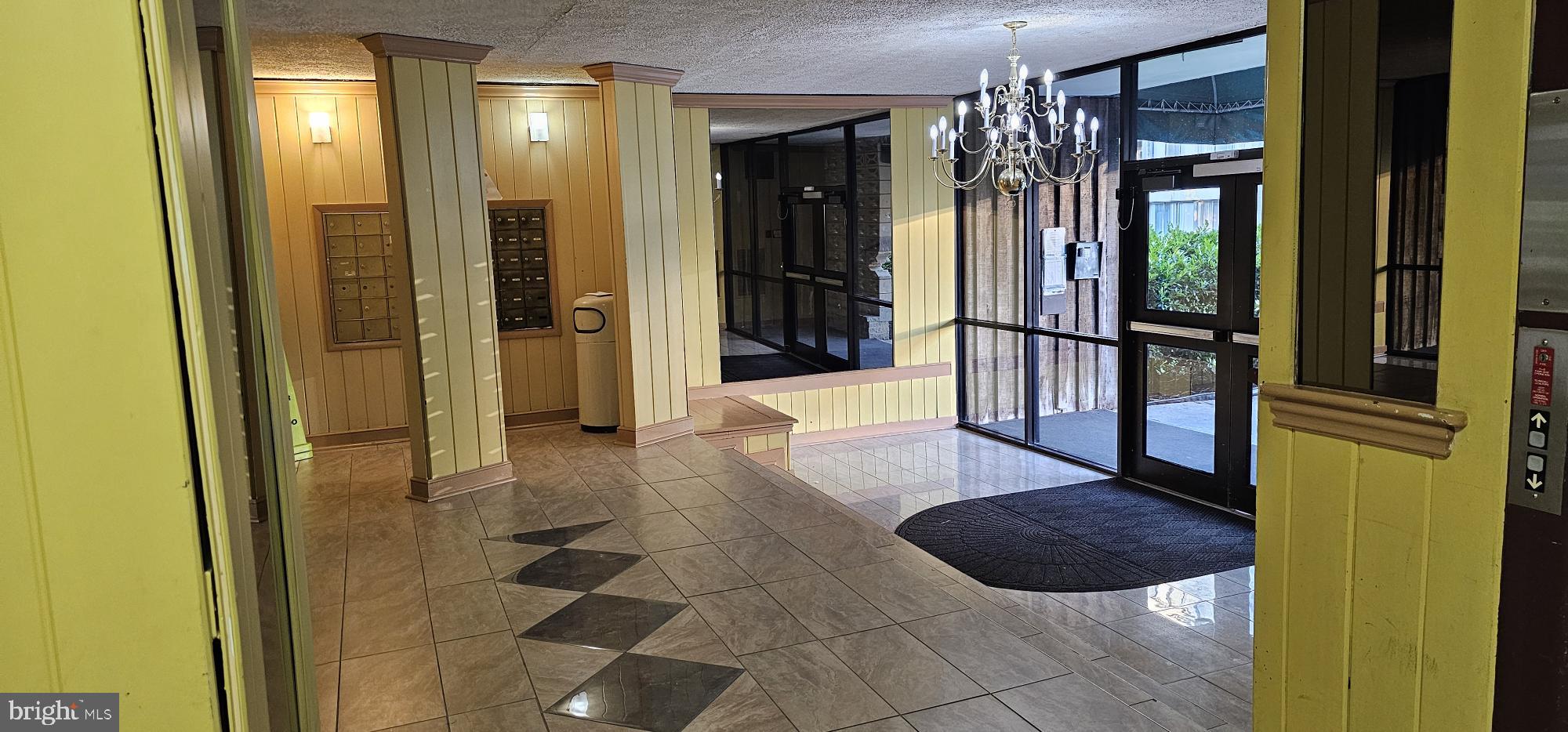 1802 Metzerott Road, Unit 503 Silver Spring, MD 20903 - Photo 10 of 11 a bathroom with a shower and a mirror