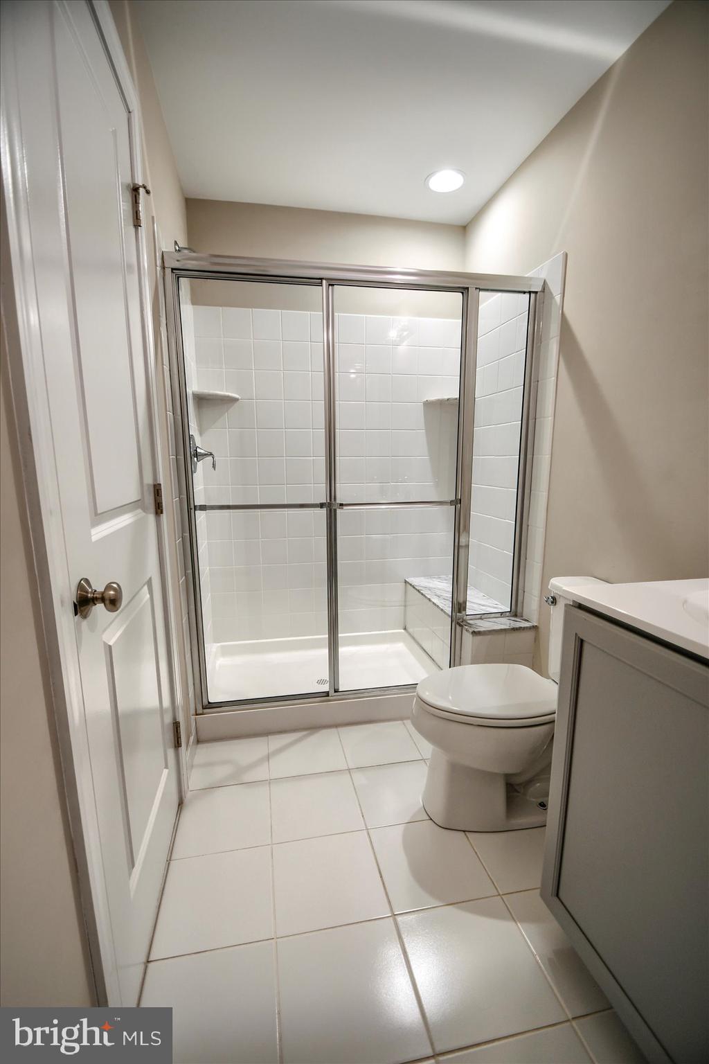 39 North Mitchell Avenue Lansdale, PA 19446 - Photo 23 of 39 a bathroom with a toilet and a shower