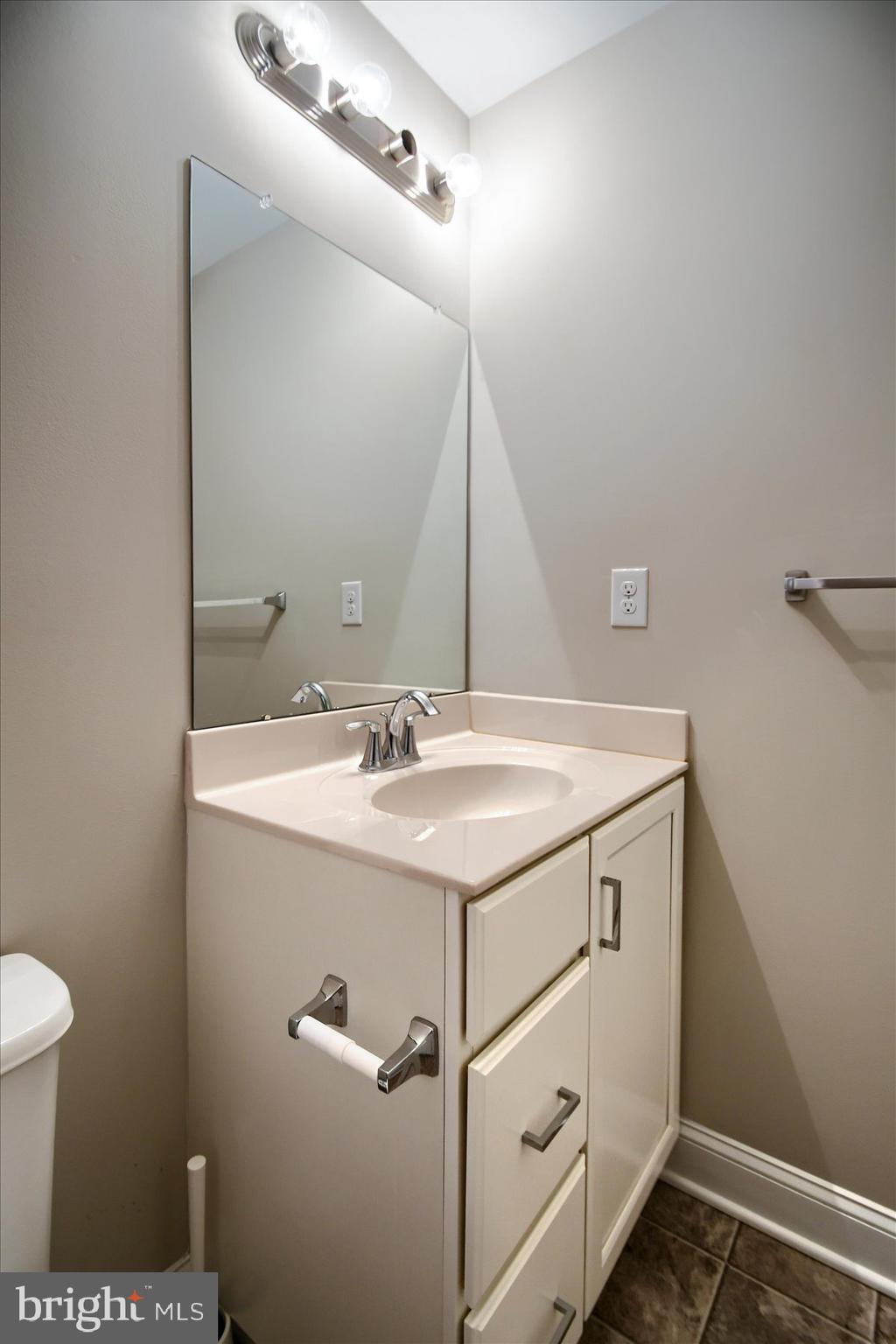 39 North Mitchell Avenue Lansdale, PA 19446 - Photo 28 of 39 a bathroom with a sink and mirror