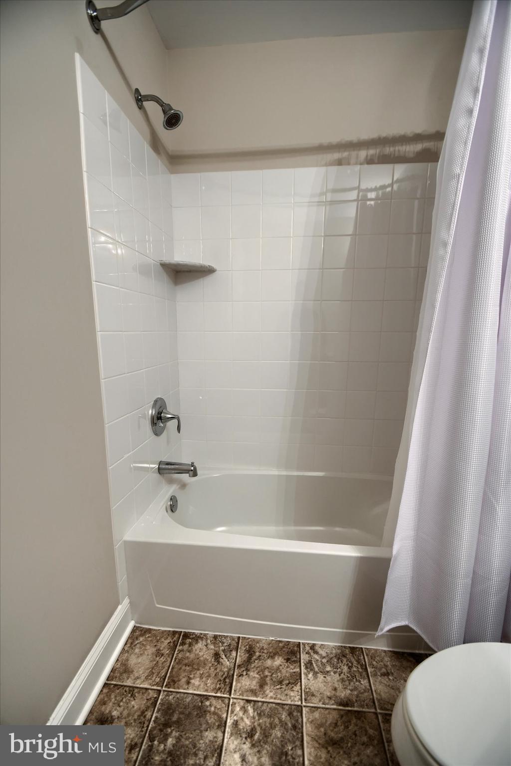 39 North Mitchell Avenue Lansdale, PA 19446 - Photo 29 of 39 a bathroom with a bathtub and a toilet