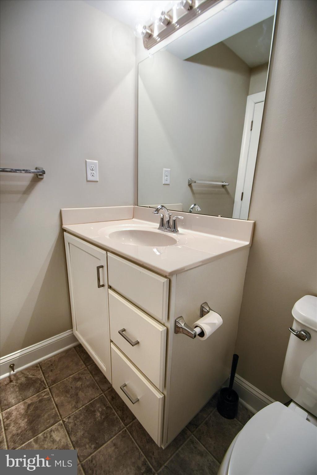 39 North Mitchell Avenue Lansdale, PA 19446 - Photo 33 of 39 a bathroom with a sink and a toilet