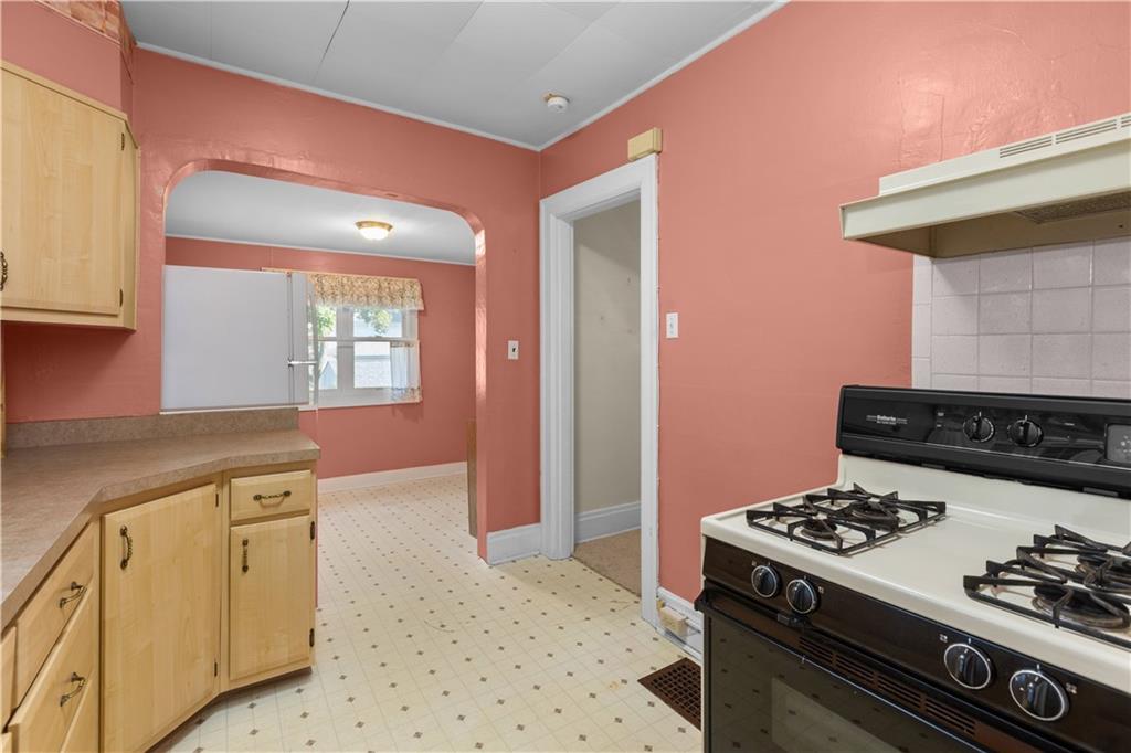 706 Nevin Avenue Sewickley, PA 15143 - Photo 15 of 40 a kitchen with a stove and a sink