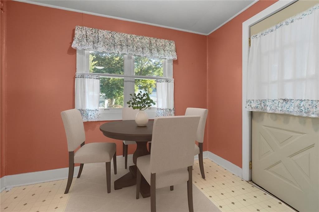 706 Nevin Avenue Sewickley, PA 15143 - Photo 17 of 40 a dining room with furniture and a window