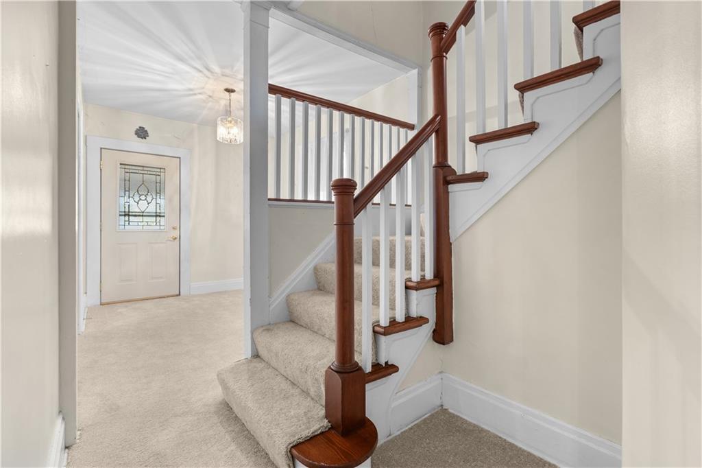 706 Nevin Avenue Sewickley, PA 15143 - Photo 19 of 40 a view of entryway and hall with a dining room