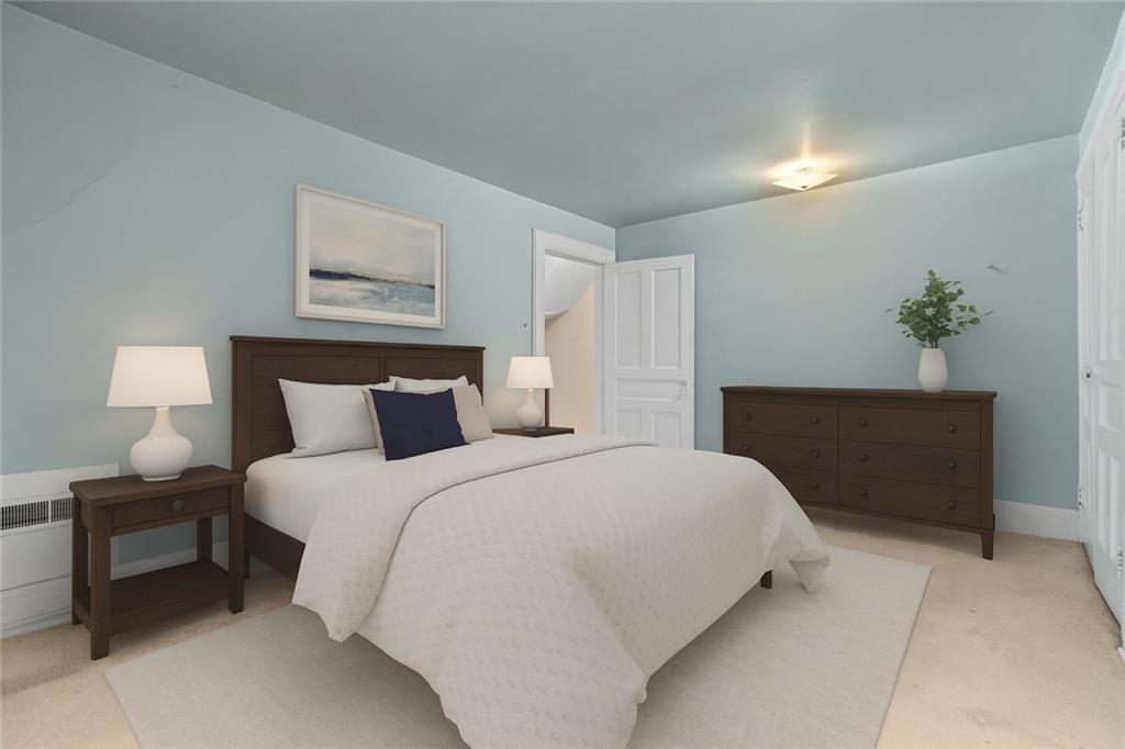 706 Nevin Avenue Sewickley, PA 15143 - Photo 20 of 40 a bedroom with bed lamp and painting on the wall