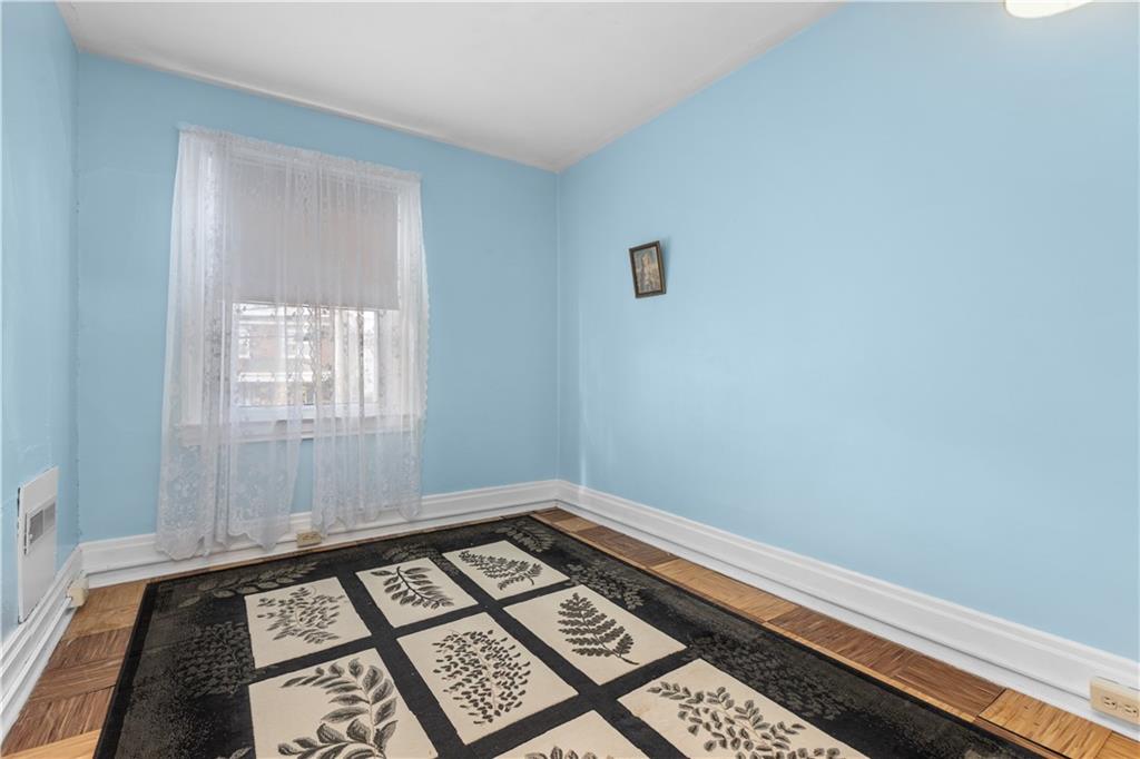 706 Nevin Avenue Sewickley, PA 15143 - Photo 23 of 40 a view of a room with wooden floor and windows