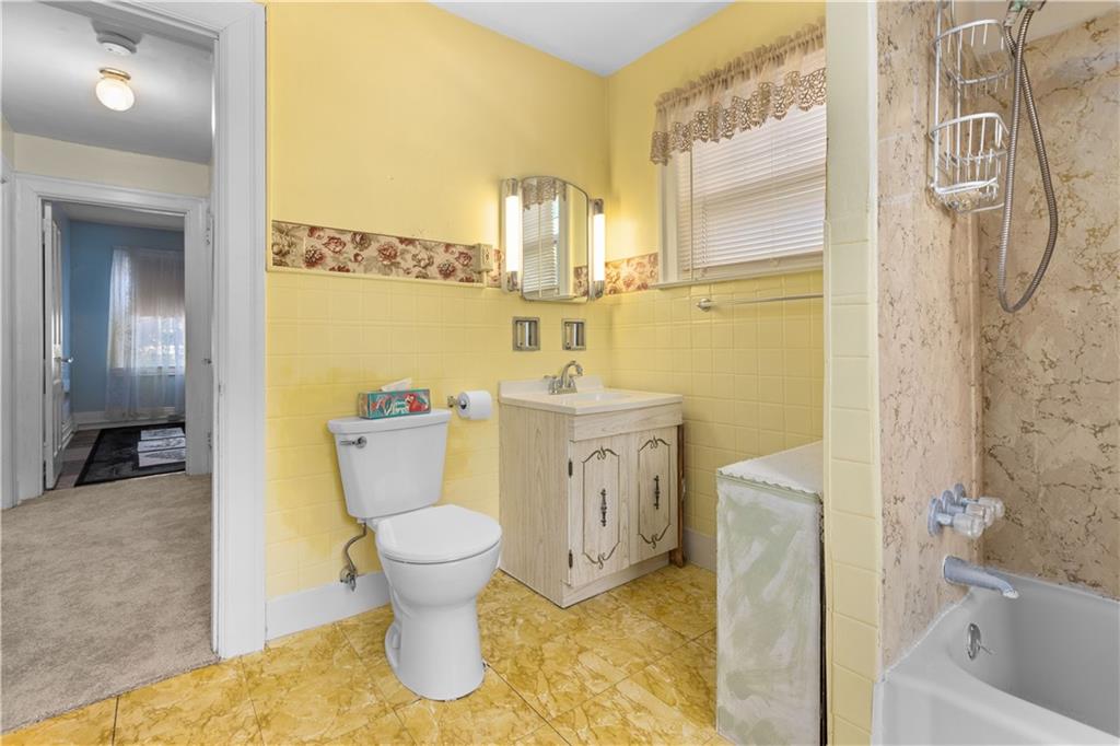 706 Nevin Avenue Sewickley, PA 15143 - Photo 26 of 40 a bathroom with a sink toilet and shower