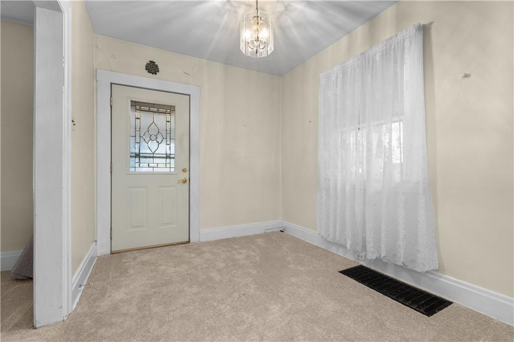 706 Nevin Avenue Sewickley, PA 15143 - Photo 6 of 40 an empty room with windows
