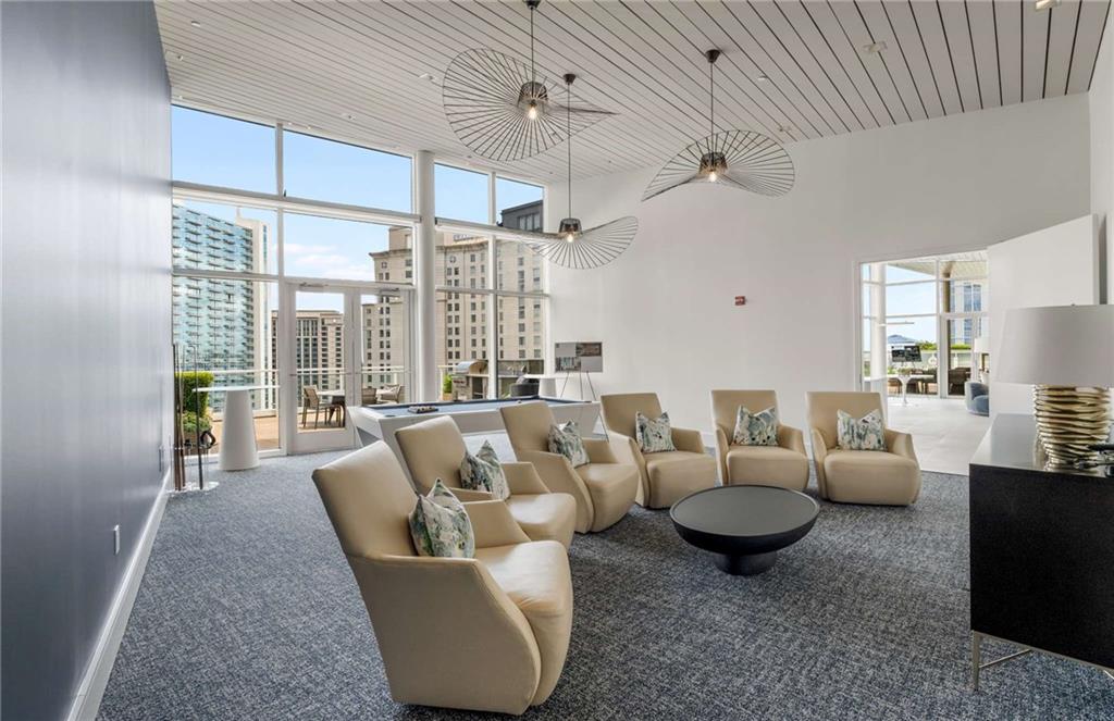 3325 Piedmont Road Northeast, Unit 2006 Atlanta, GA 30305 - Photo 50 of 78 a living room with furniture and a ceiling fan