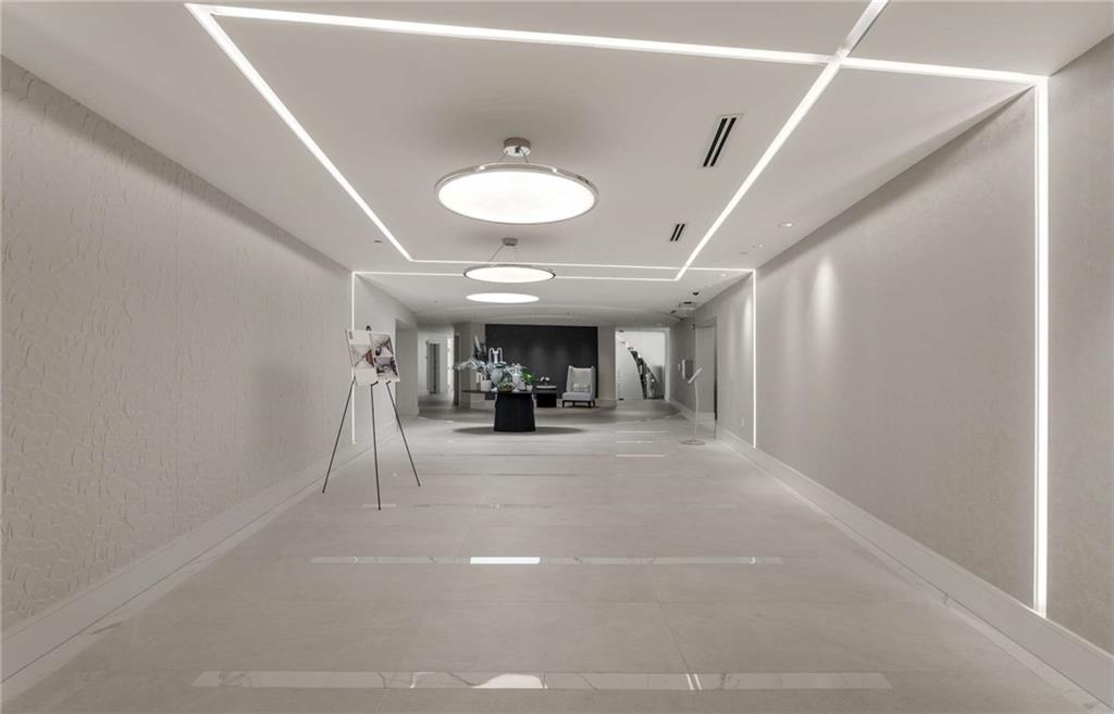 3325 Piedmont Road Northeast, Unit 2006 Atlanta, GA 30305 - Photo 55 of 78 a view of living room with furniture and a chandelier