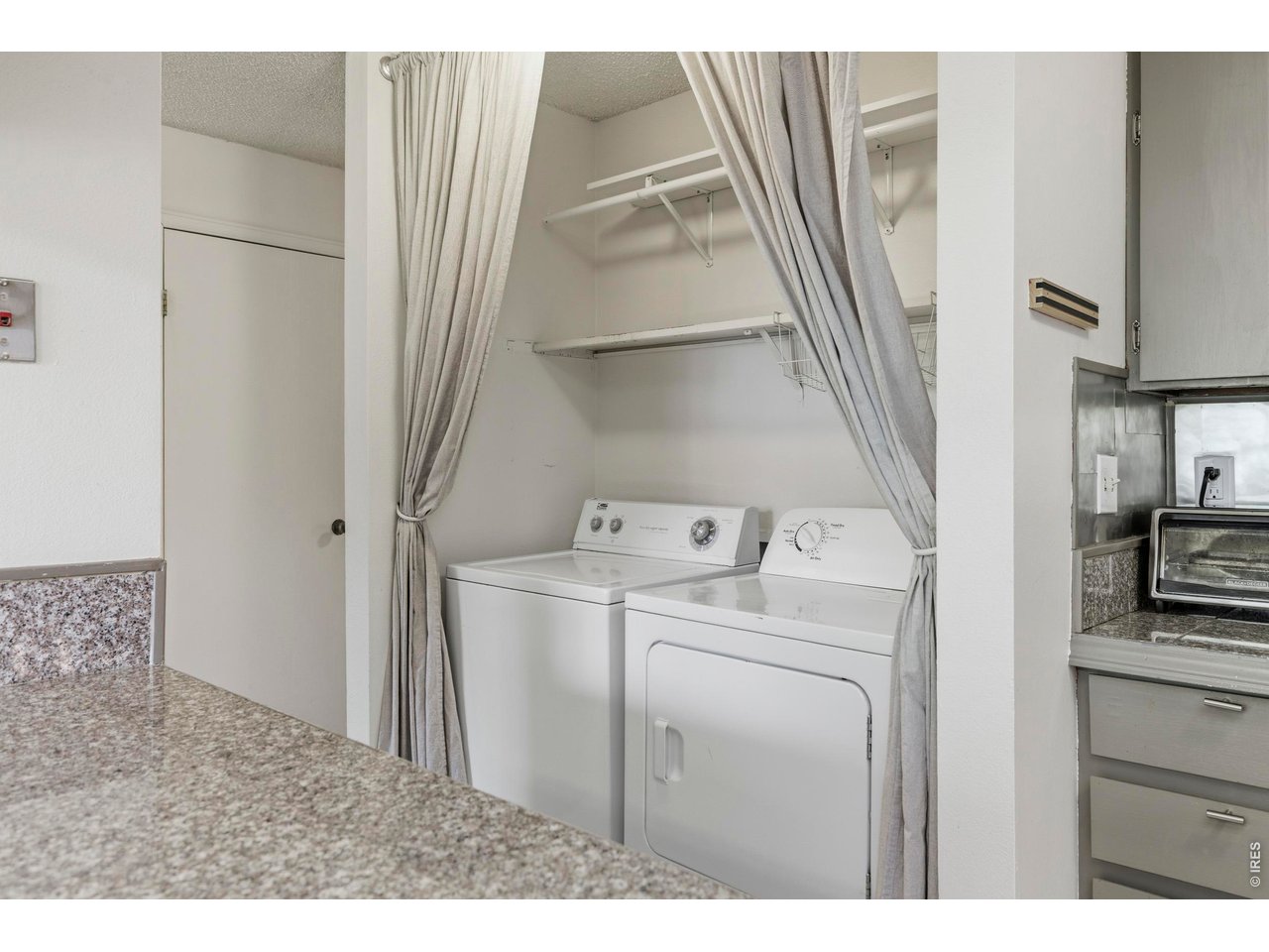 925 Columbia Road, Unit 824 Fort Collins, CO 80525 - Photo 19 of 36 a utility room with dryer and washer