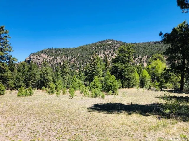 a view of mountain view with mountains in the background