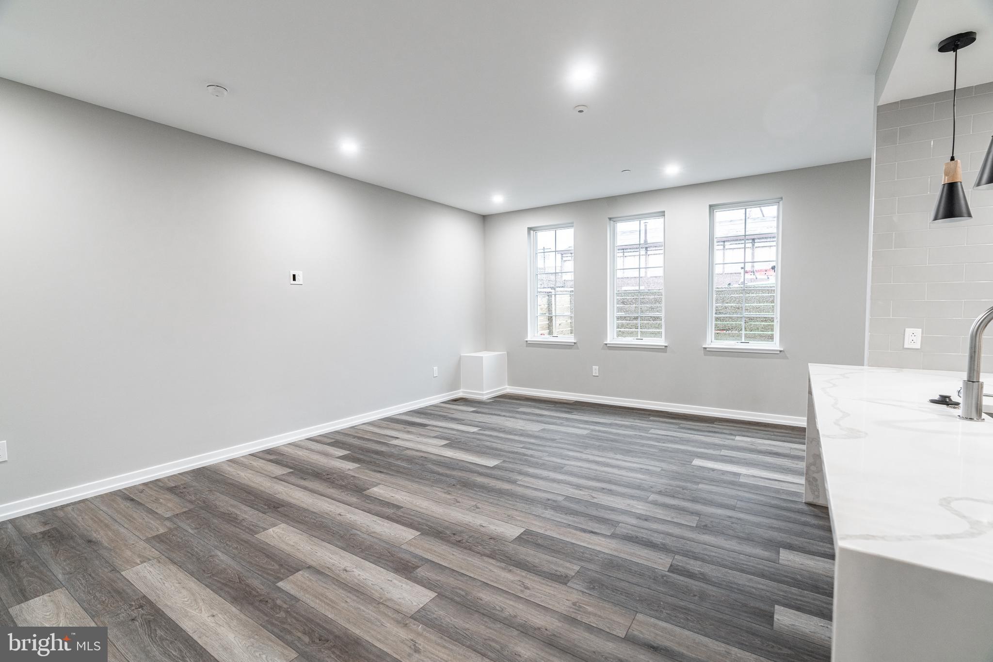 2412 Innovator Way Philadelphia, PA 19146 - Photo 20 of 117 a view of an empty room with wooden floor and a window