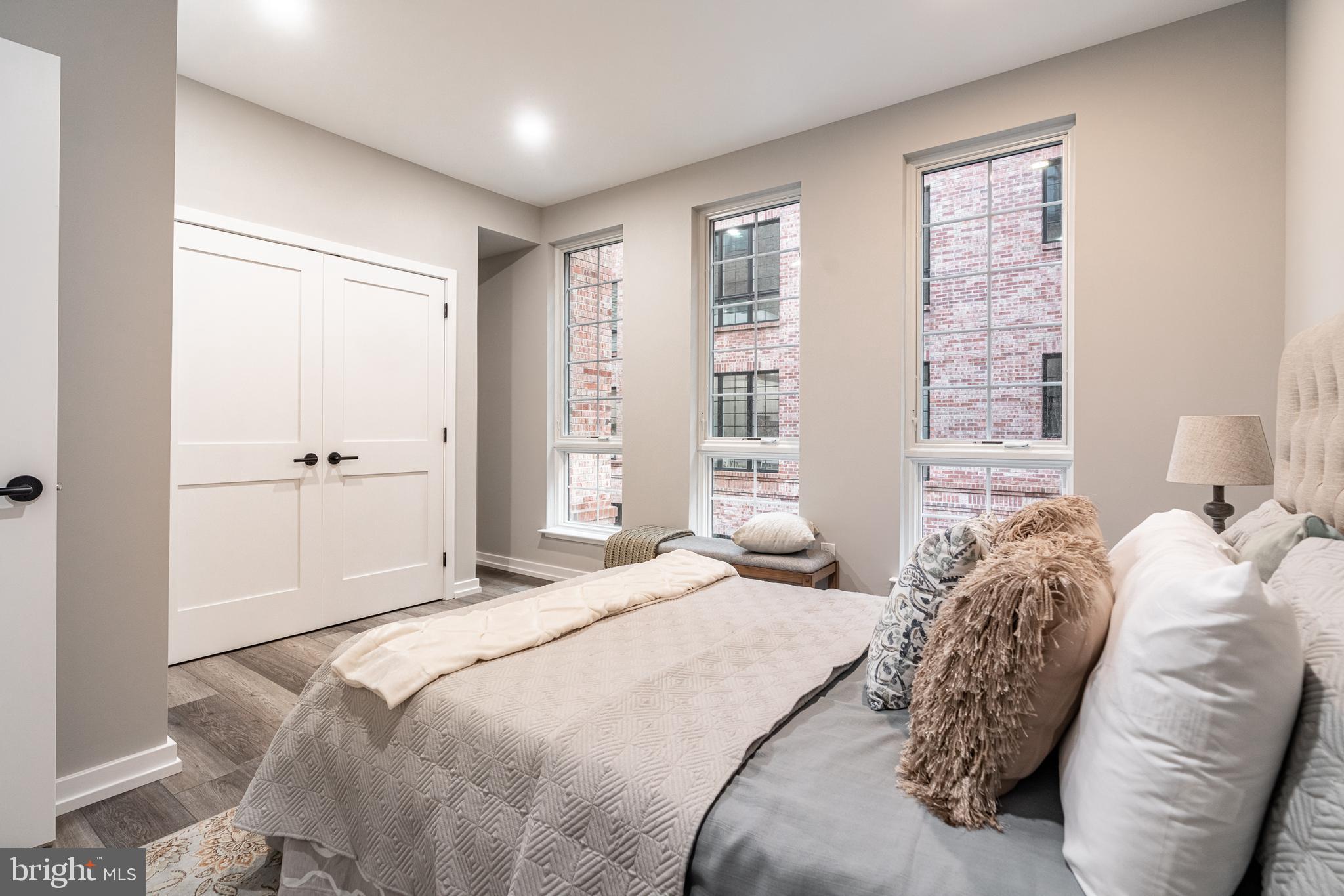 2412 Innovator Way Philadelphia, PA 19146 - Photo 53 of 117 a bedroom with a large bed and a window