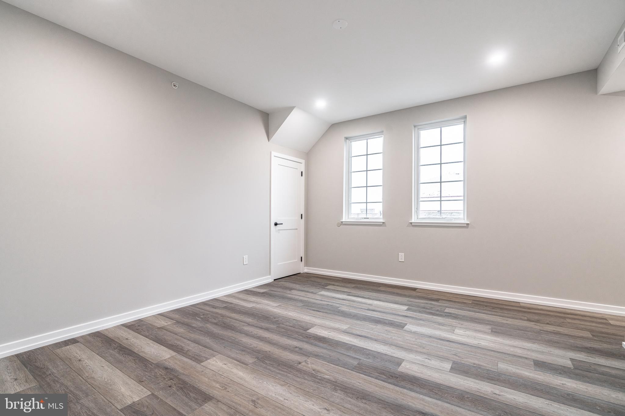 2412 Innovator Way Philadelphia, PA 19146 - Photo 96 of 117 wooden floor in an empty room with a window