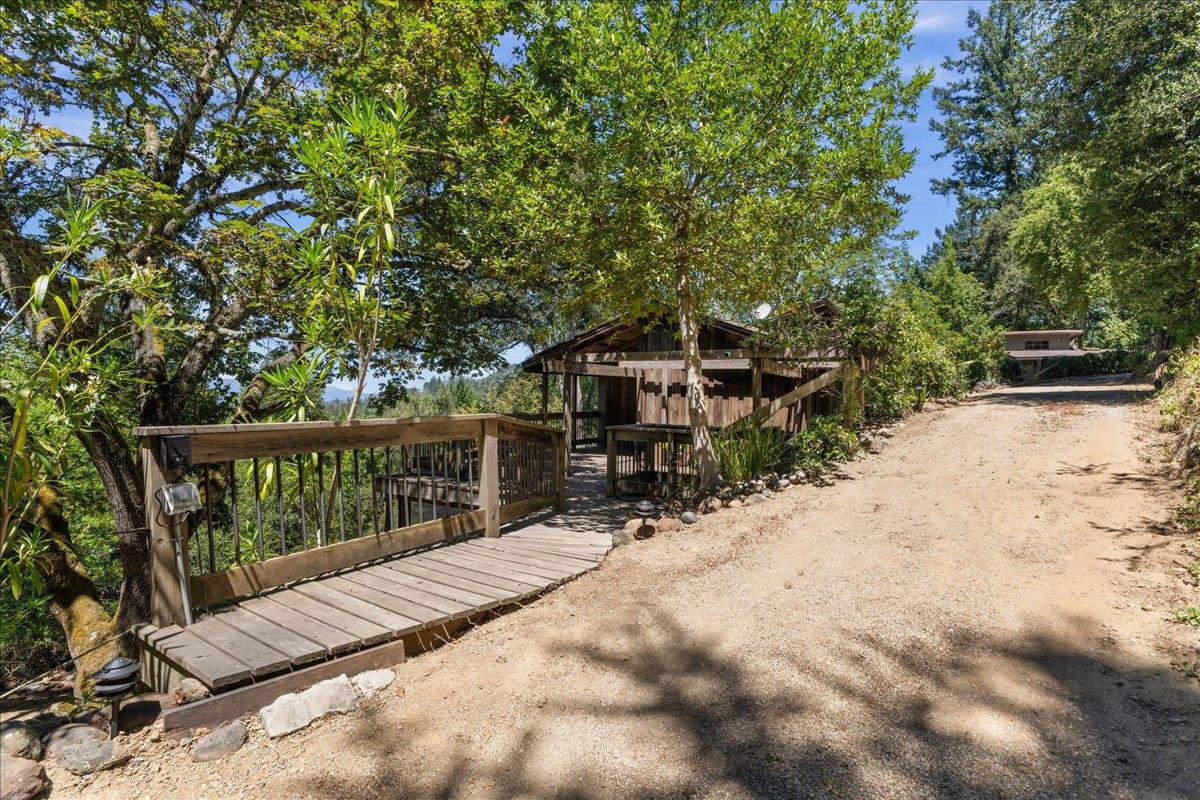 15171 Old Ranch Road Los Gatos, CA 95033 - Photo 3 of 26 a view of balcony with wooden fence and trees