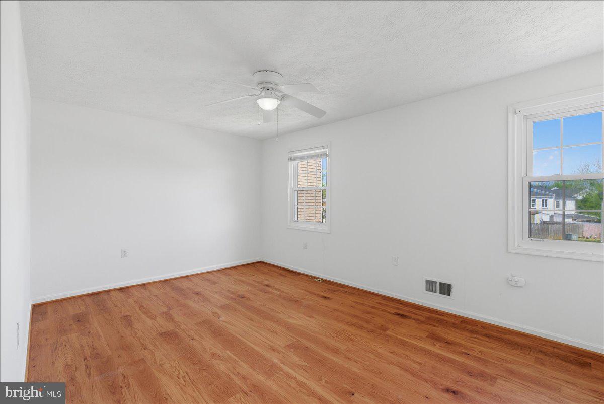 10177 Irongate Way Manassas, VA 20109 - Photo 8 of 28 wooden floor in an empty room
