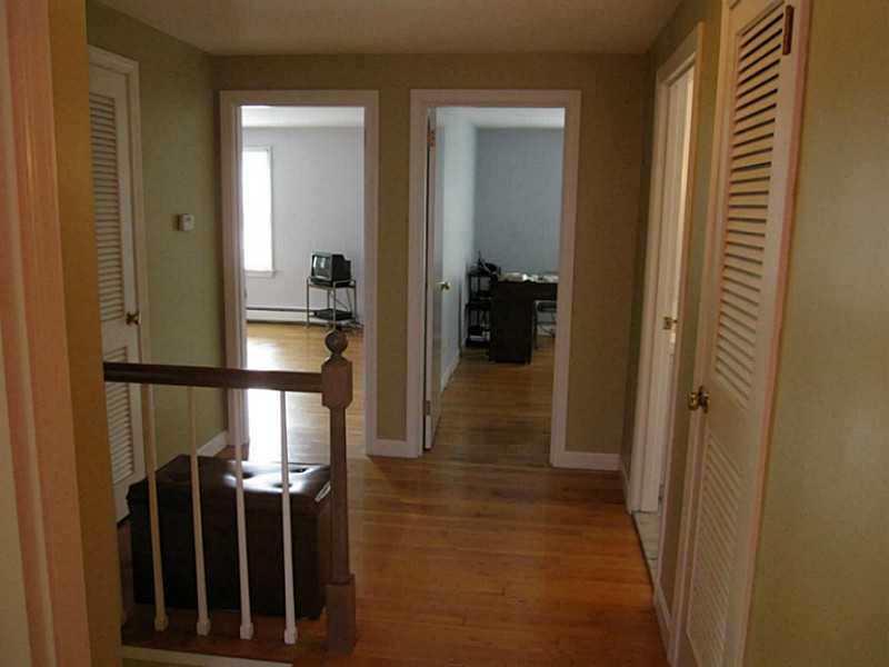 82 Sedgefield Road North Kingstown, RI 02852 - Photo 19 of 22 Bedroom. Upstairs hall and hardwoods in all bedrooms.