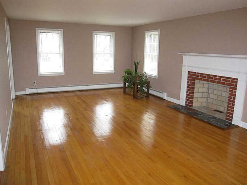 82 Sedgefield Road North Kingstown, RI 02852 - Photo 5 of 22 Living Room. Living Room has 1 of 2 fireplaces.
