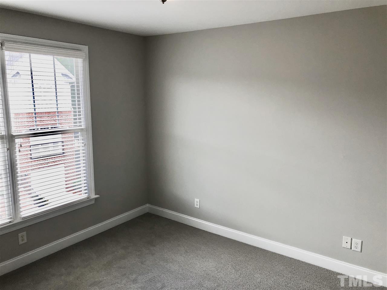 6107 Shandwick Court Raleigh, NC 27609 - Photo 10 of 21 Brand new carpet in the bedrooms and in the bedroom/bonus on the lower level.