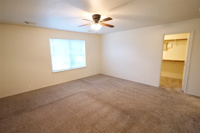 en view of an empty room with a window