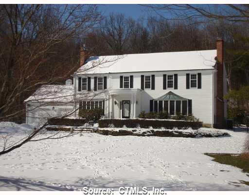 1 Fox Chase Road Bloomfield, CT 06002 - Photo 1 of 1 a front view of a house with yard