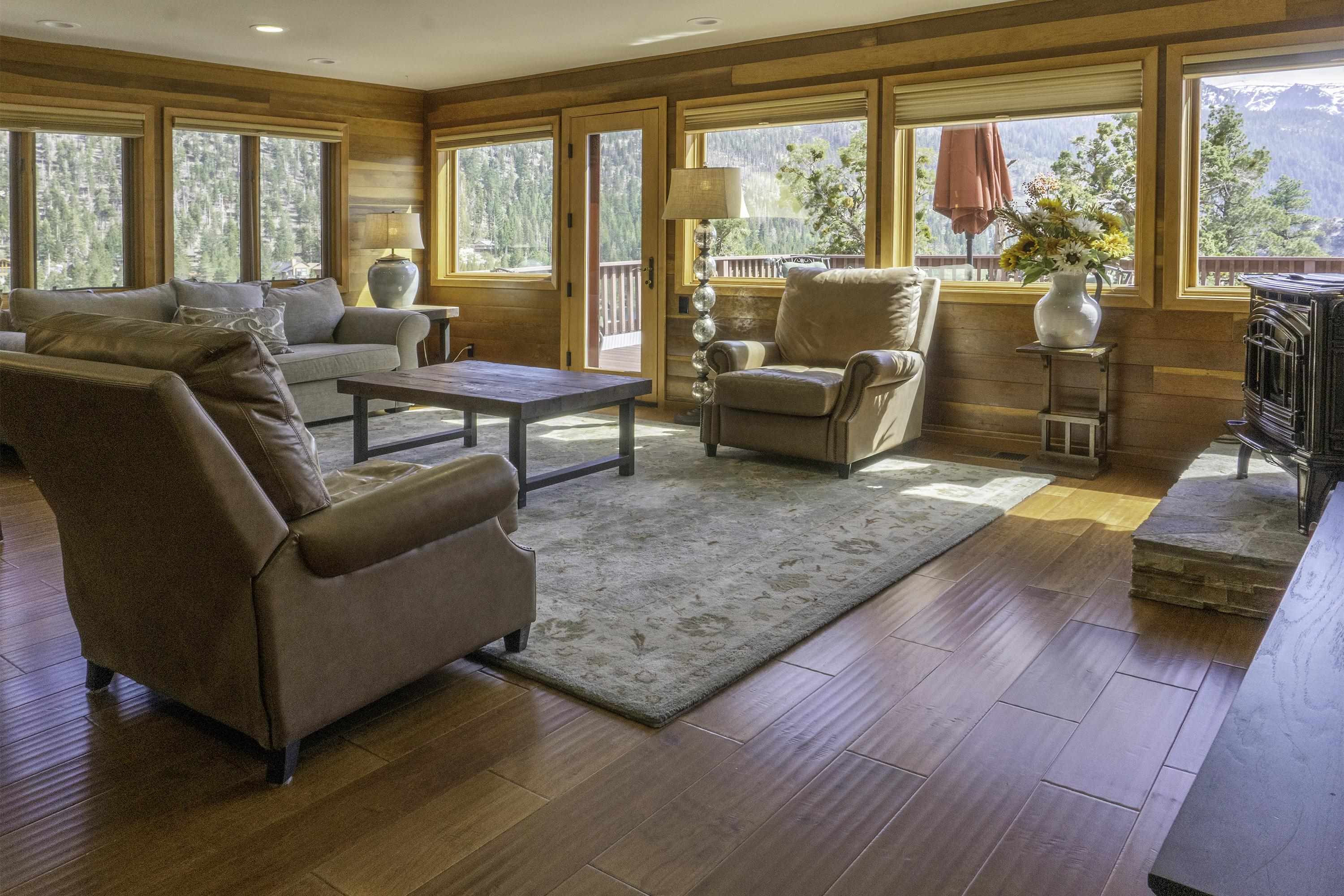 214 Skyline Road June Lake, CA 93529 - Photo 2 of 39 a living room with furniture and a large window