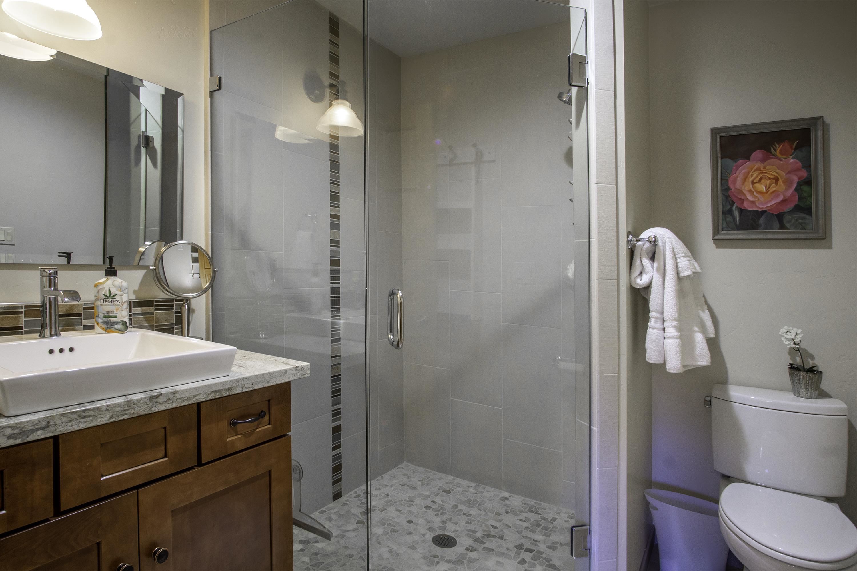 214 Skyline Road June Lake, CA 93529 - Photo 22 of 39 a bathroom with a sink a toilet and shower