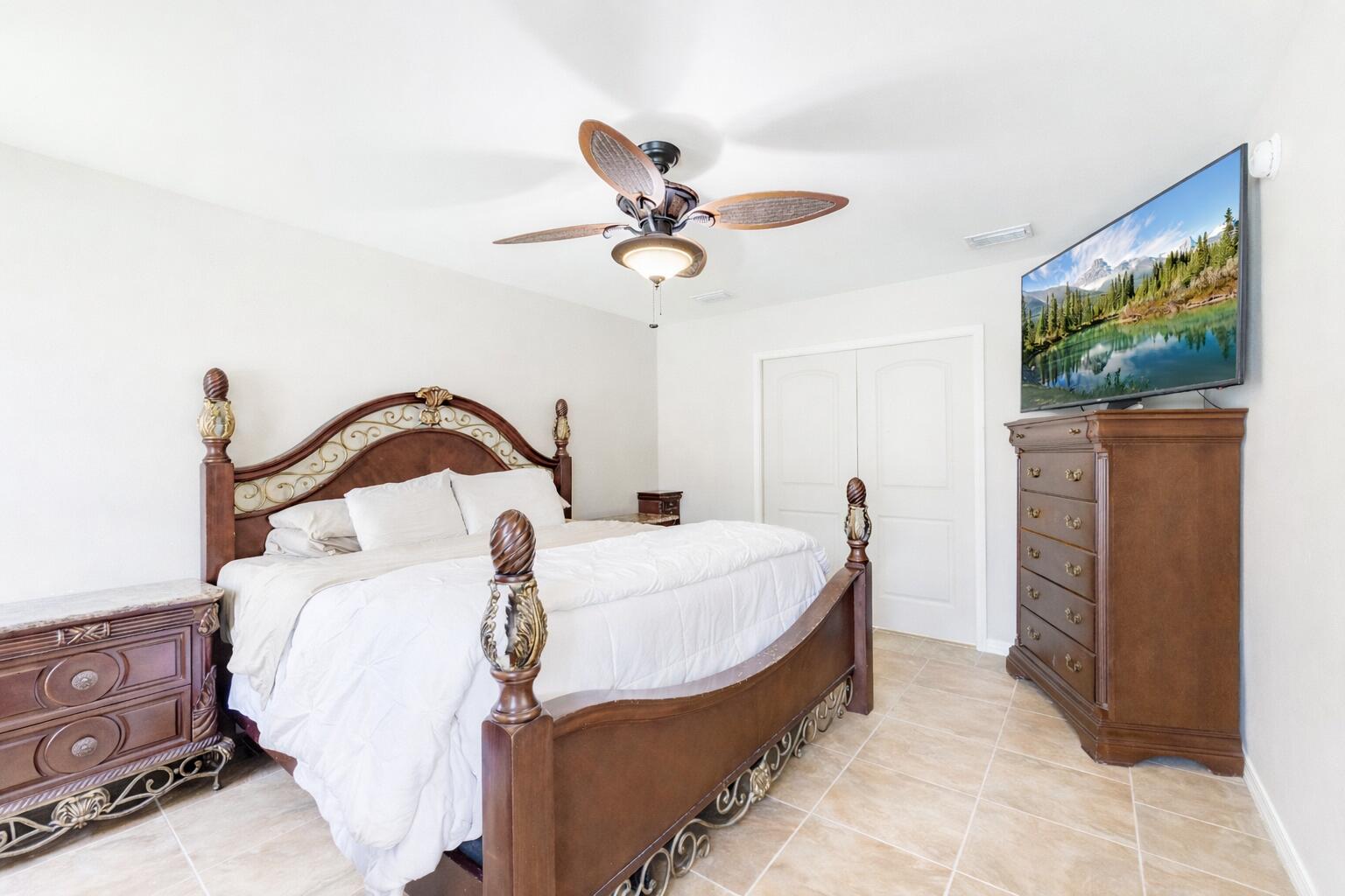 1582 Greenwood Road Baker, FL 32531 - Photo 17 of 49 a bedroom with a bed and a dresser