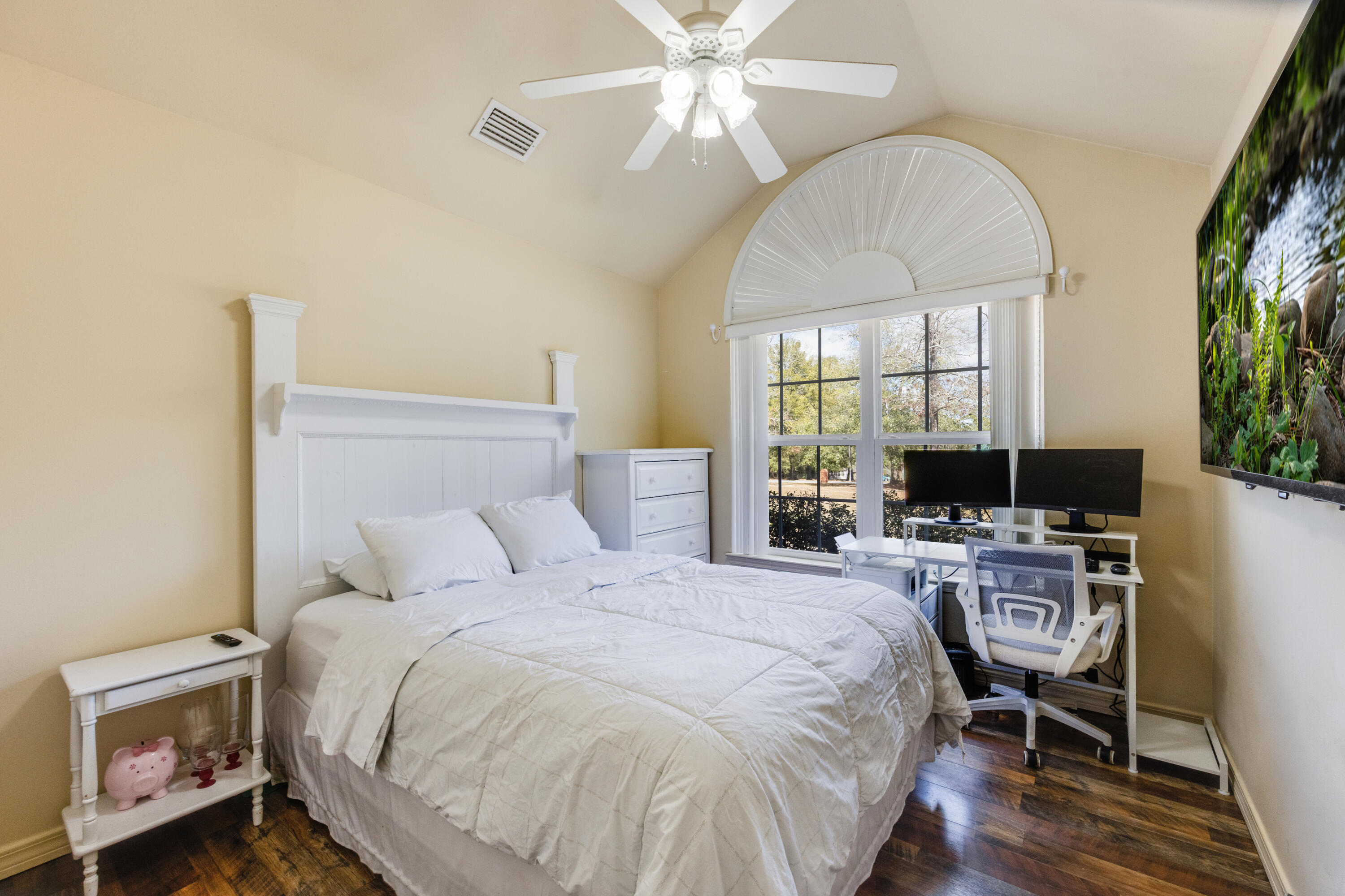 1582 Greenwood Road Baker, FL 32531 - Photo 22 of 49 a bed room with a bed and a chair