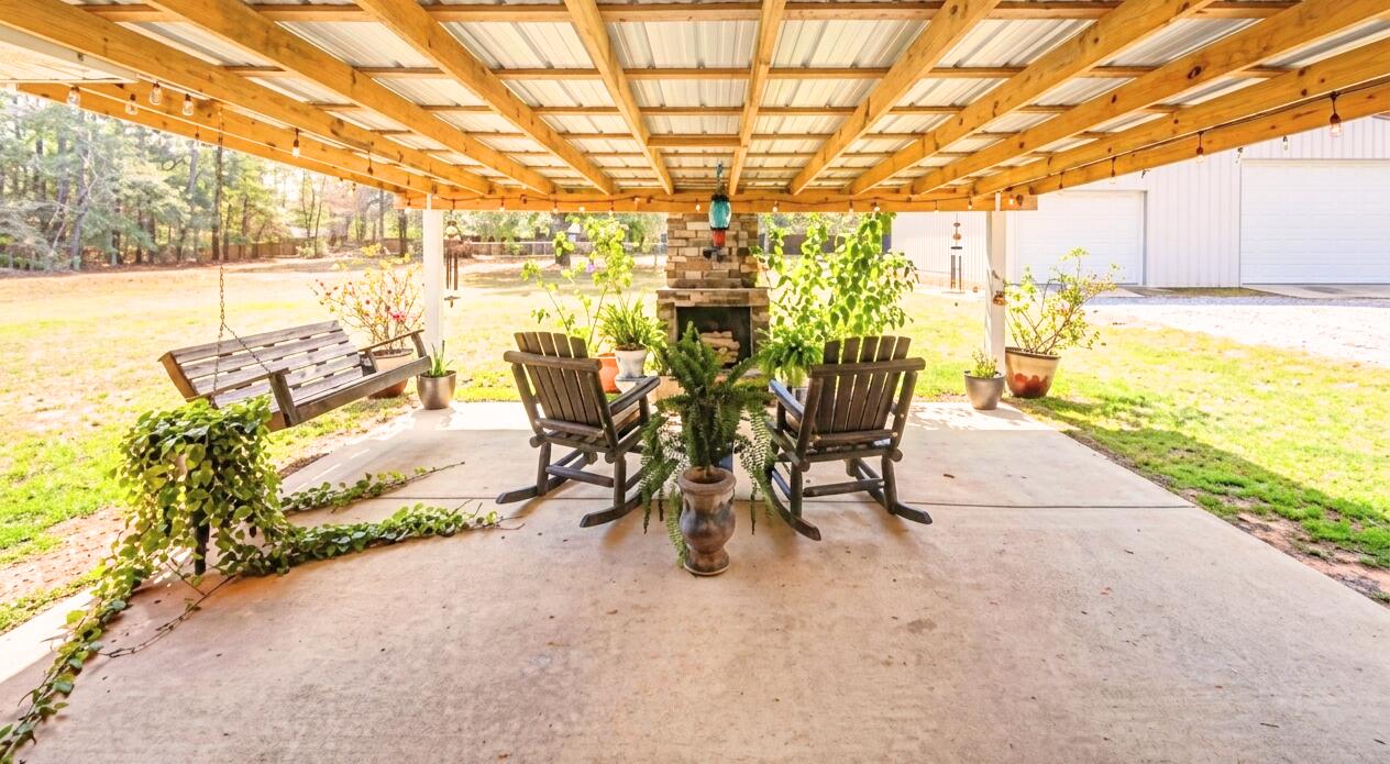 1582 Greenwood Road Baker, FL 32531 - Photo 27 of 49 a view of swimming pool with outdoor seating