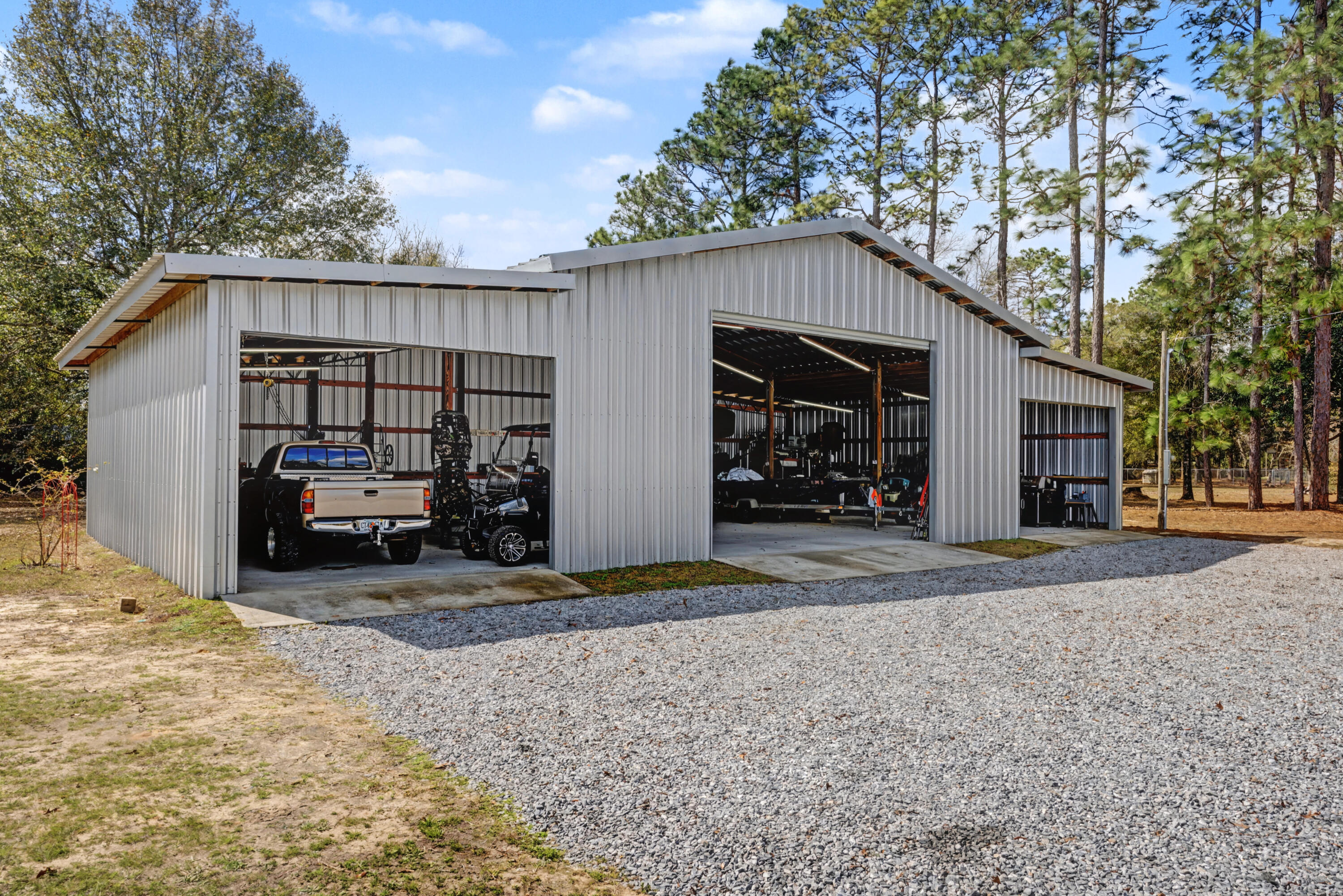 1582 Greenwood Road Baker, FL 32531 - Photo 3 of 49 a view of a car garage