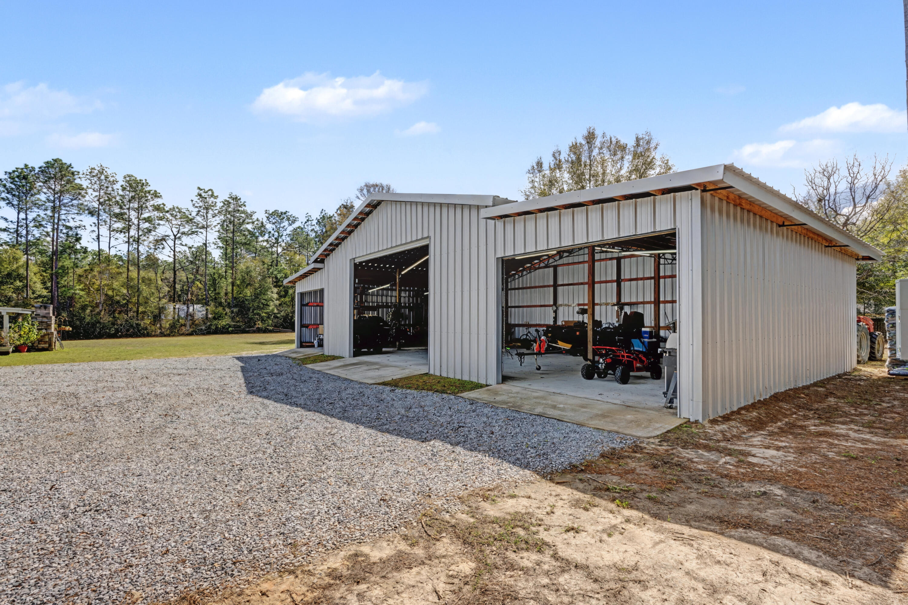 1582 Greenwood Road Baker, FL 32531 - Photo 36 of 49 a view of a house with backyard and porch