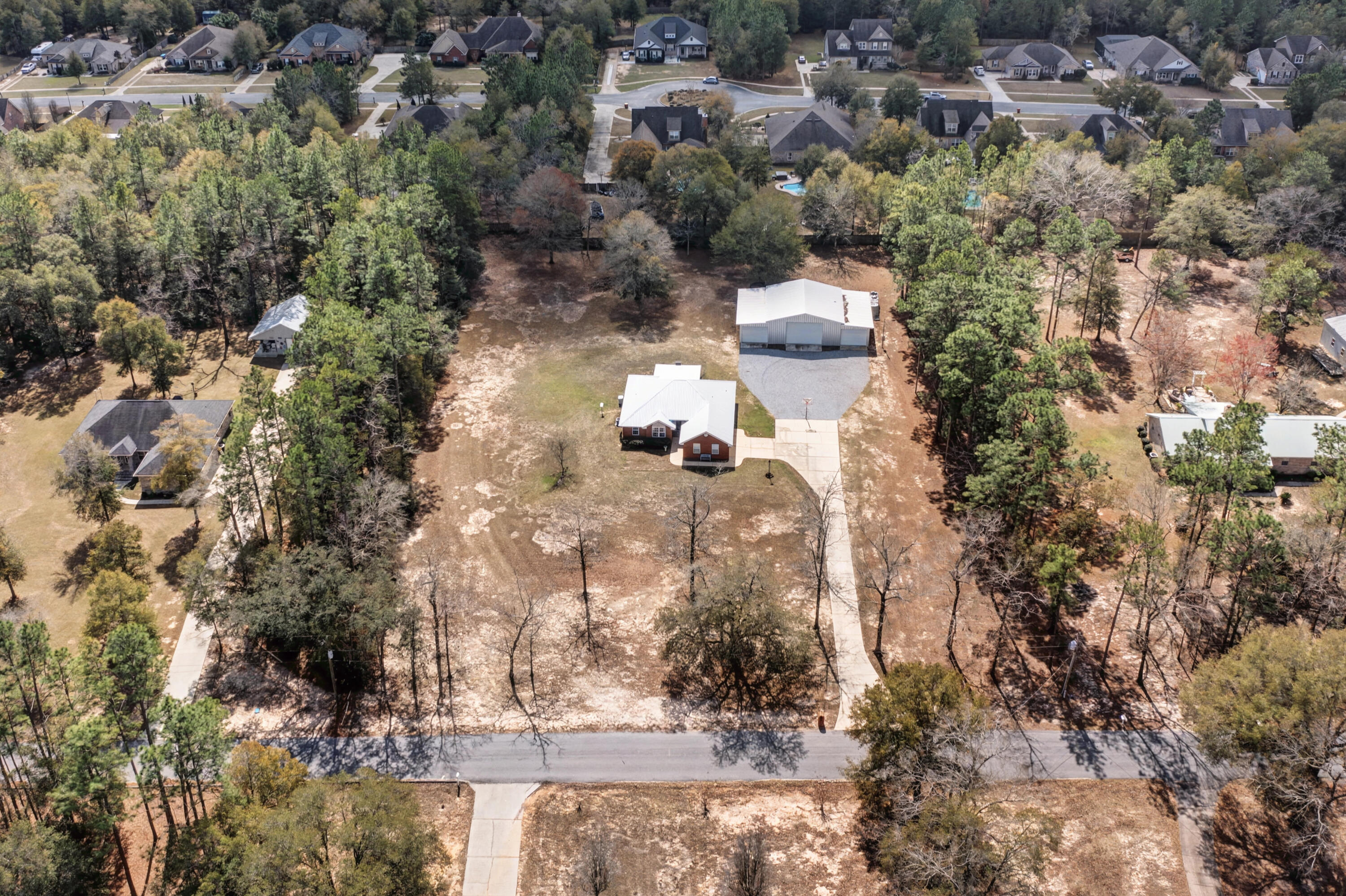 1582 Greenwood Road Baker, FL 32531 - Photo 46 of 49 an aerial view of residential houses with outdoor space
