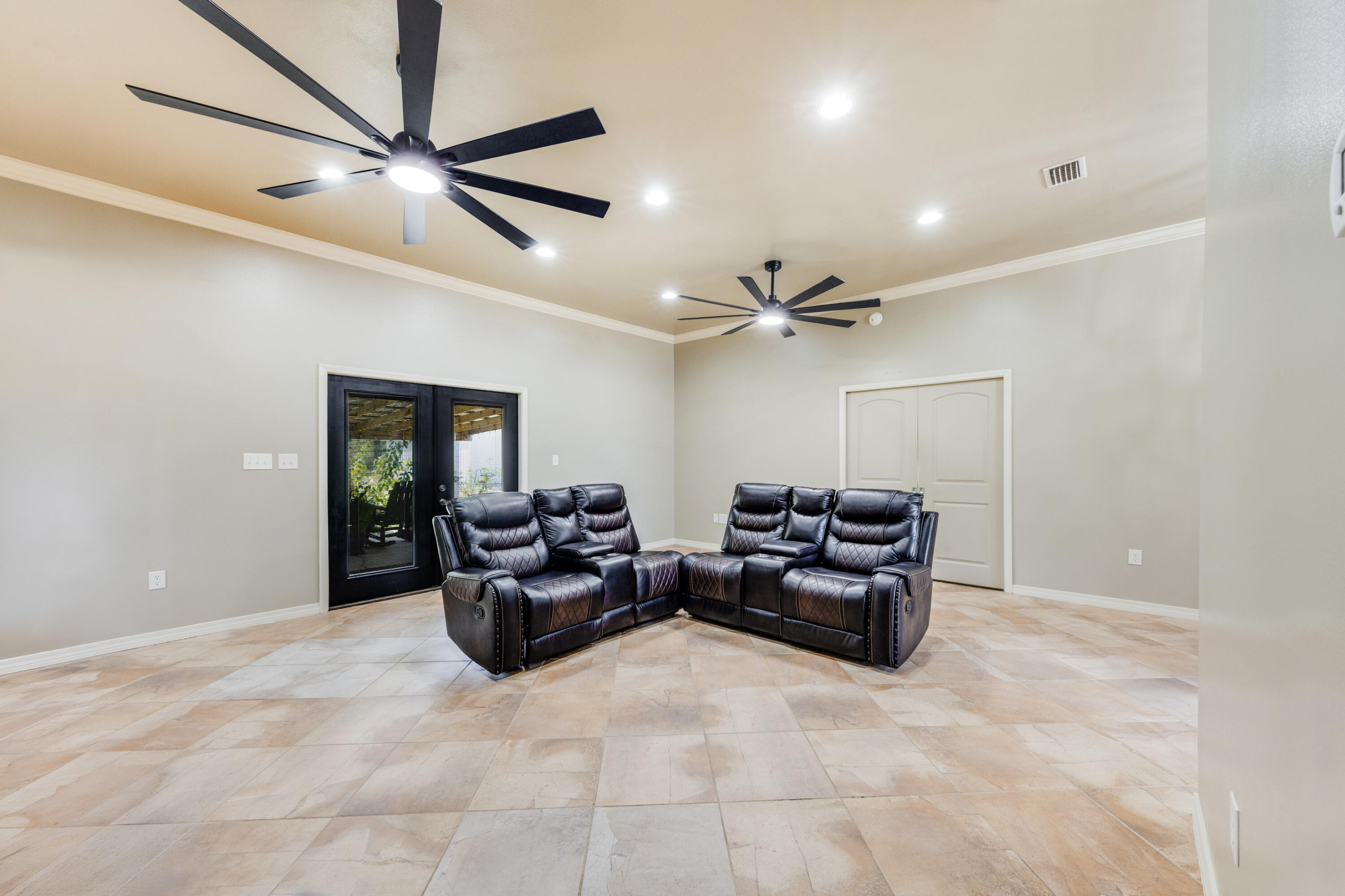 1582 Greenwood Road Baker, FL 32531 - Photo 7 of 49 a living room with furniture and a ceiling fan