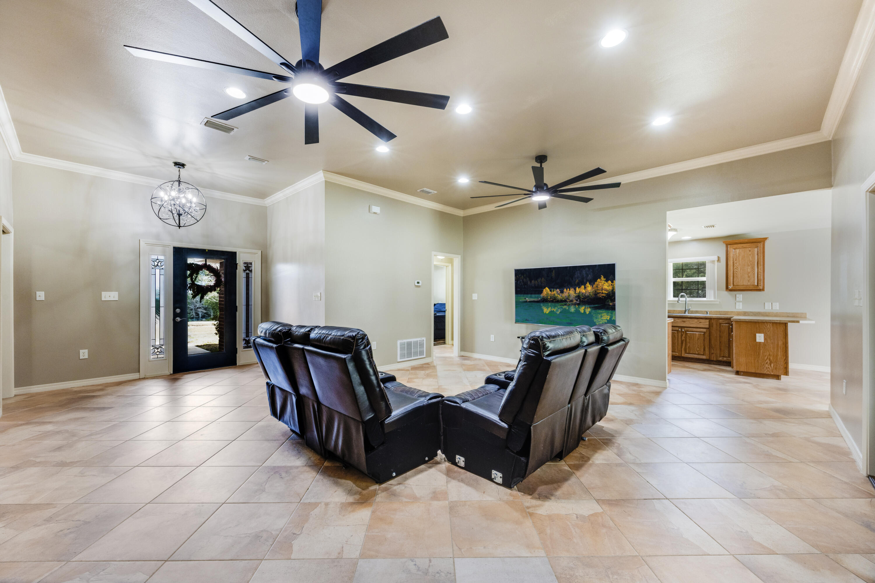 1582 Greenwood Road Baker, FL 32531 - Photo 9 of 49 a living room with furniture and a flat screen tv