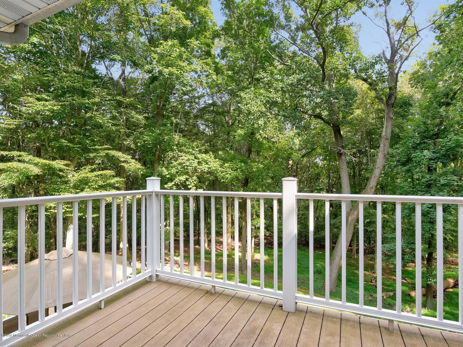 76 Reids Hill Road Morganville, NJ 07751 - Photo 28 of 36 028_Master Bedroom Terrace