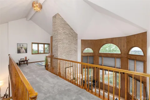 a view of a large window with wooden floor