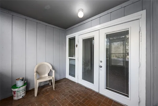 a room with a table and chairs
