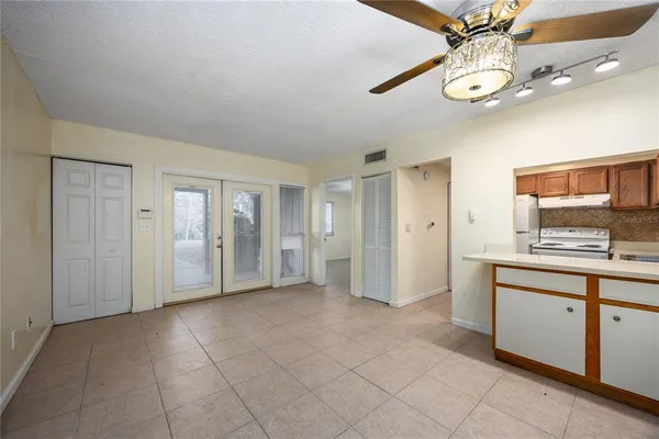a view of a kitchen with a sink and cabinet area
