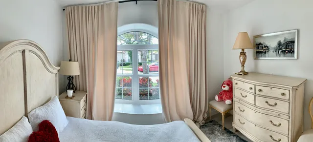 a view of a bedroom from a bedroom