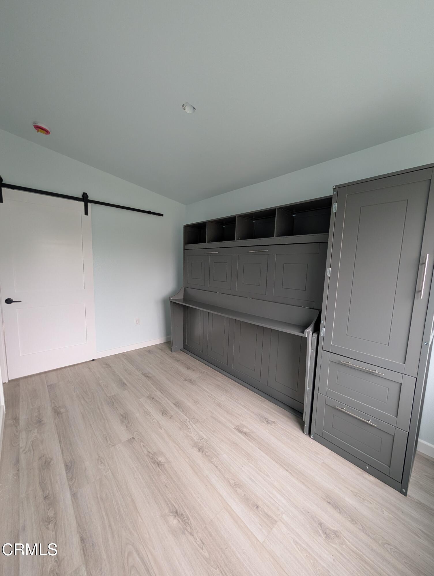 2220 Joyce Place, Unit 2 Oxnard, CA 93033 - Photo 6 of 11 a view of walk in closet with empty racks