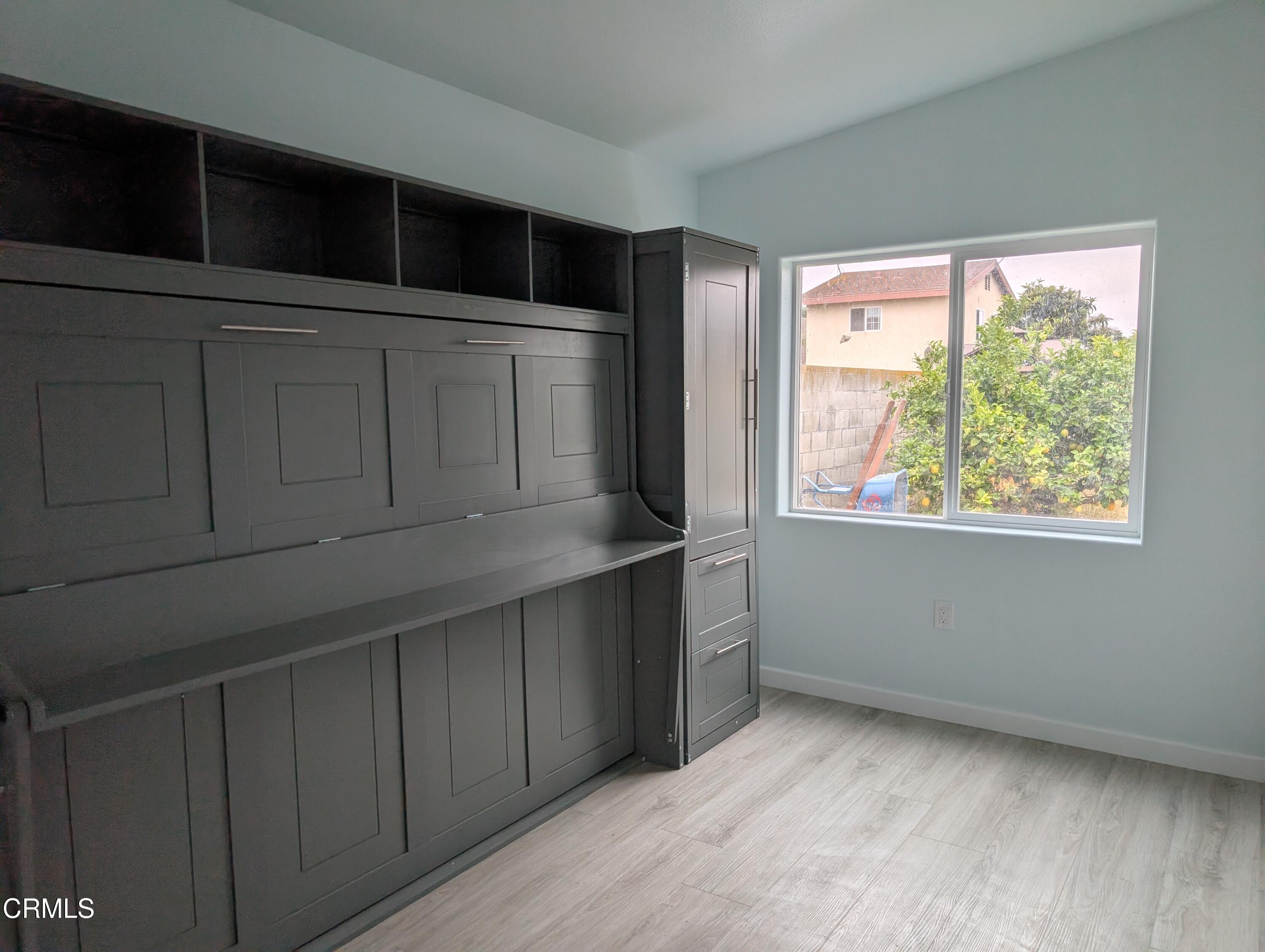 2220 Joyce Place, Unit 2 Oxnard, CA 93033 - Photo 10 of 11 a living room with a large window
