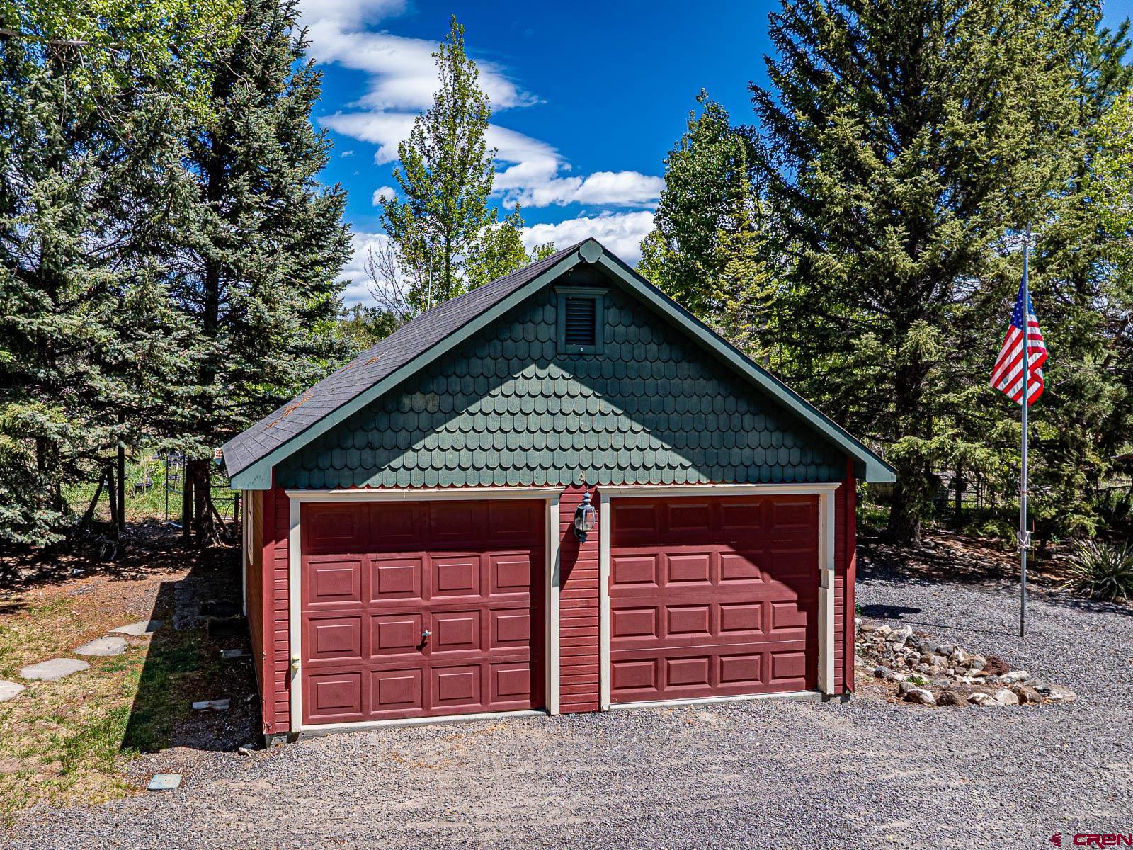 16331 2550th Road Cedaredge, CO 81413 - Photo 36 of 45 a front view of a house with a garage
