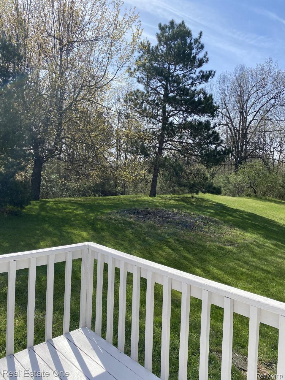 3147 Roods Lake Road Lapeer, MI 48446 - Photo 63 of 66 deck to front yard.jpg