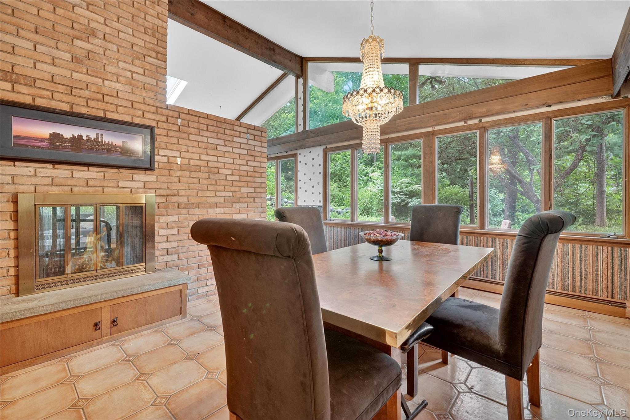 4 Cedar Hill Road Bedford, NY 10506 - Photo 13 of 50 a view of a dining room with furniture a chandelier and wooden floor