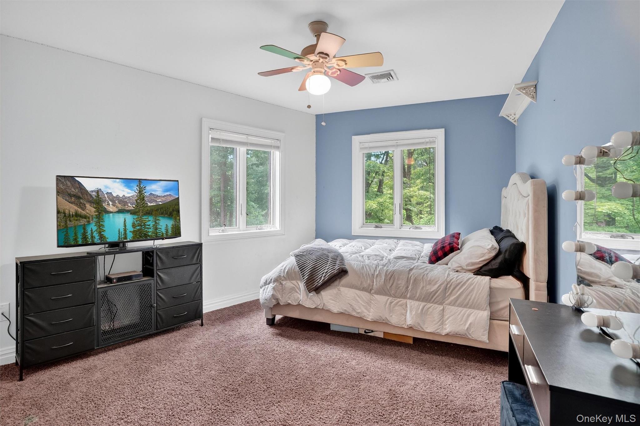 4 Cedar Hill Road Bedford, NY 10506 - Photo 29 of 50 a bedroom with bed and a flat screen tv