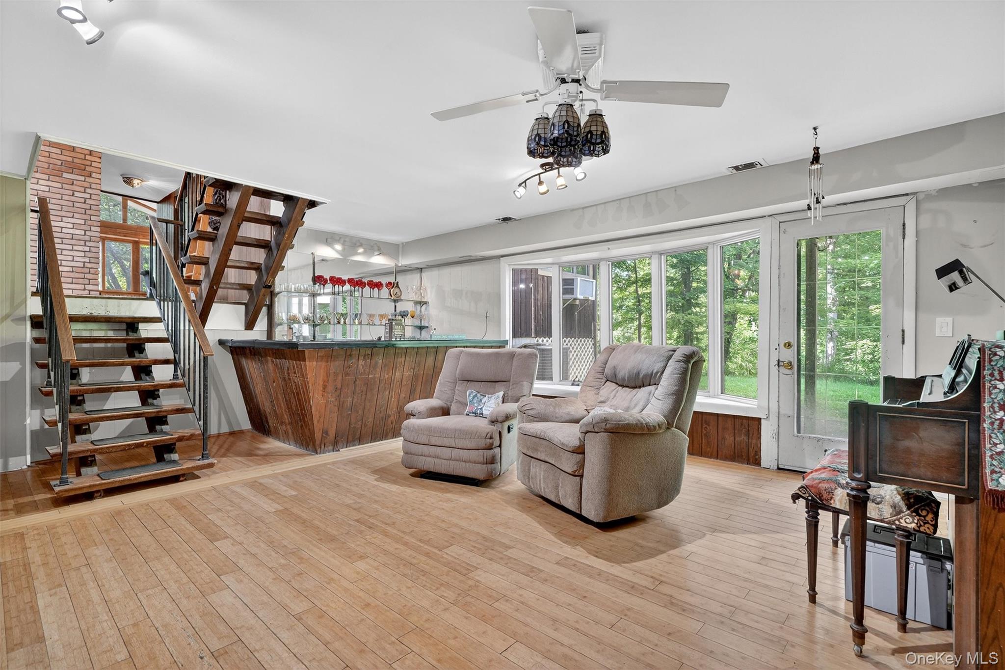4 Cedar Hill Road Bedford, NY 10506 - Photo 34 of 50 a living room with furniture and a flat screen tv